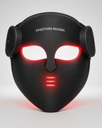 Masque LED visage VELYSERA noir allumé en lumière rouge